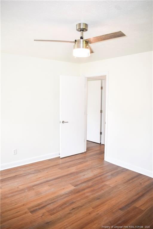5404 S Sumac Cir, Fayetteville, NC 28304 - empty room with wood finished floors and baseboards