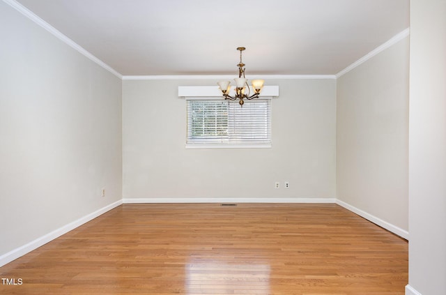 5807 Craig Rd, Durham, NC 27712 - unfurnished room with a chandelier, ornamental molding, and light wood finished floors