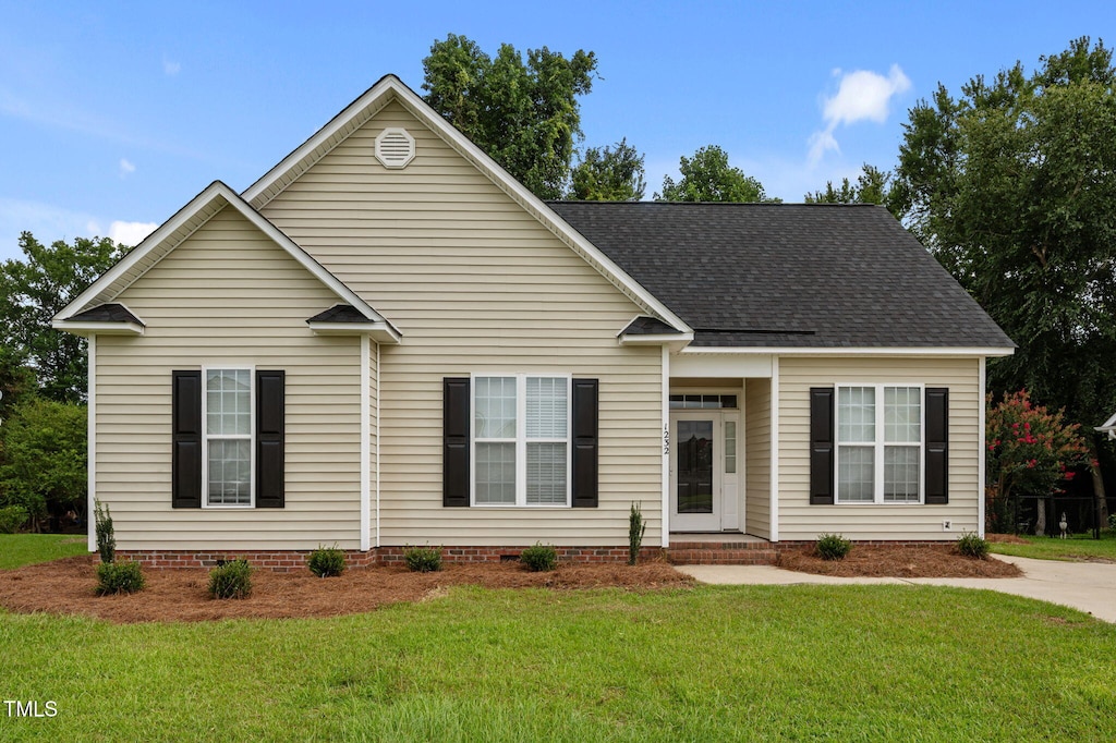 1232 Ashmoor Ln, Winterville, NC 28590 - view of front facade with a front lawn, crawl space, and roof with shingles