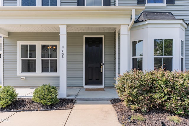 3409 Table Mountain Pine Dr, Raleigh, NC 27616 - view of exterior entry featuring covered porch