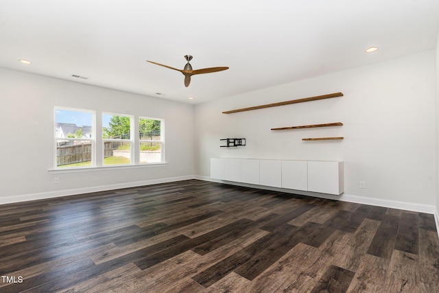3409 Table Mountain Pine Dr, Raleigh, NC 27616 - unfurnished living room with dark wood-type flooring, ceiling fan, and recessed lighting