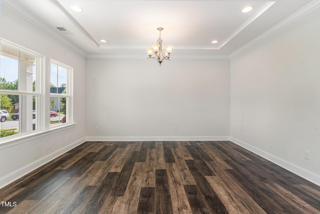 3409 Table Mountain Pine Dr, Raleigh, NC 27616 - spare room with a chandelier, dark wood finished floors, recessed lighting, ornamental molding, and a tray ceiling