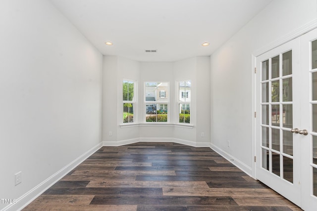 3409 Table Mountain Pine Dr, Raleigh, NC 27616 - empty room featuring recessed lighting, wood finished floors, and french doors