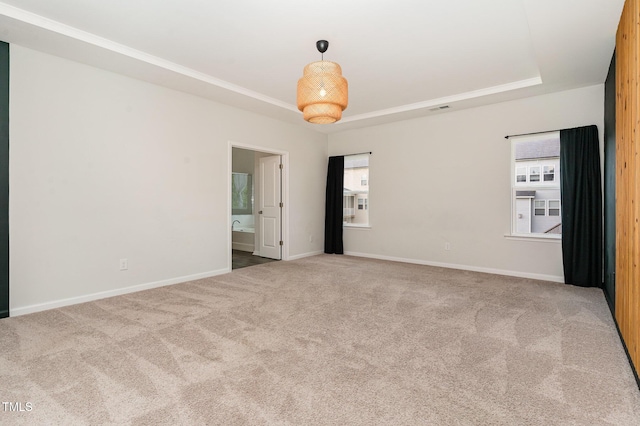 3409 Table Mountain Pine Dr, Raleigh, NC 27616 - carpeted empty room with a tray ceiling and baseboards