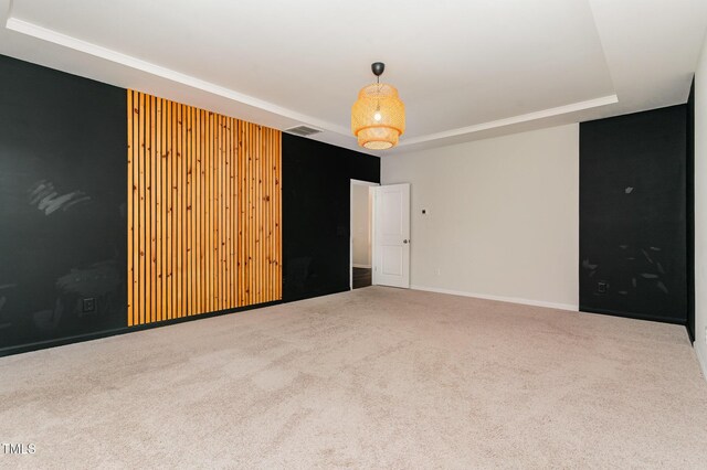 3409 Table Mountain Pine Dr, Raleigh, NC 27616 - carpeted empty room with a tray ceiling and baseboards