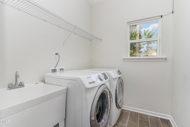 3409 Table Mountain Pine Dr, Raleigh, NC 27616 - laundry room featuring washer and clothes dryer and wood finish floors