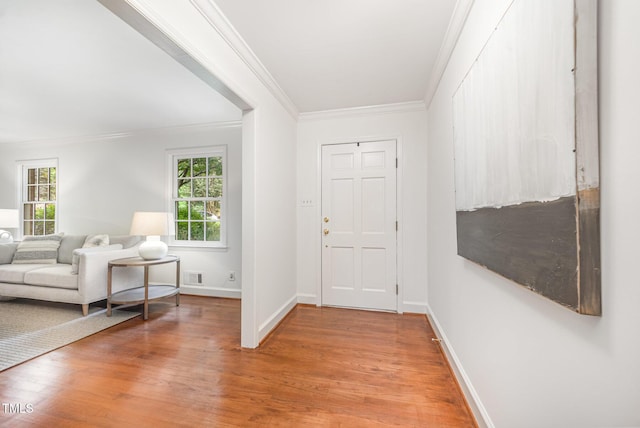 2425 Wentworth St, Raleigh, NC 27612 - entryway with ornamental molding and light wood-type flooring