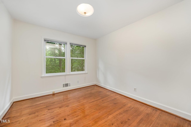 2425 Wentworth St, Raleigh, NC 27612 - unfurnished room featuring light wood-style floors and baseboards