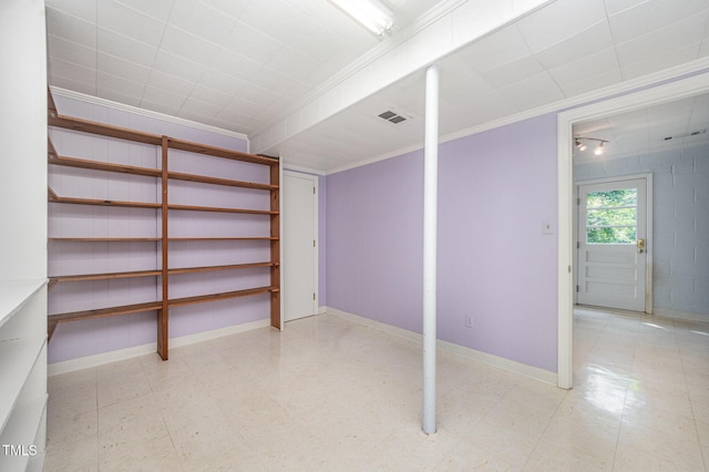 2425 Wentworth St, Raleigh, NC 27612 - below grade area with ornamental molding and tile patterned floors