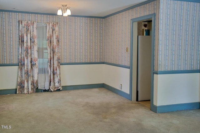 205 Forest Rd, Oxford, NC 27565 - carpeted spare room with crown molding, a chandelier, and wallpapered walls