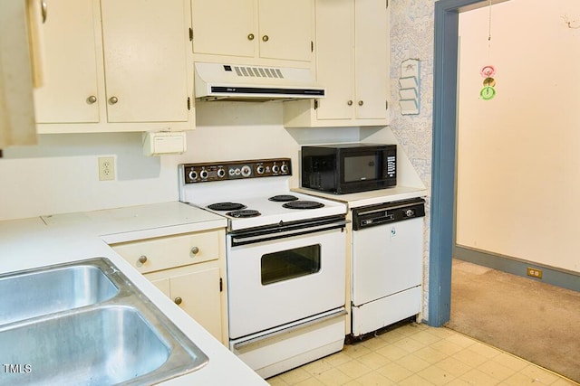 205 Forest Rd, Oxford, NC 27565 - kitchen with white appliances, custom exhaust hood, light countertops, and light carpet