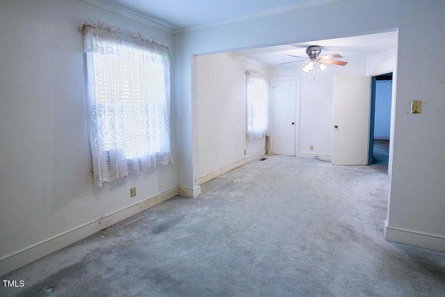 205 Forest Rd, Oxford, NC 27565 - empty room featuring healthy amount of natural light, ornamental molding, and a ceiling fan