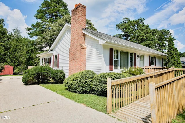 205 Forest Rd, Oxford, NC 27565 - view of front of property with a chimney and a wooden deck