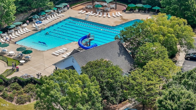 1401 Patterson Grove Rd, Apex, NC 27502 - aerial view of a pool and a tree filled landscape