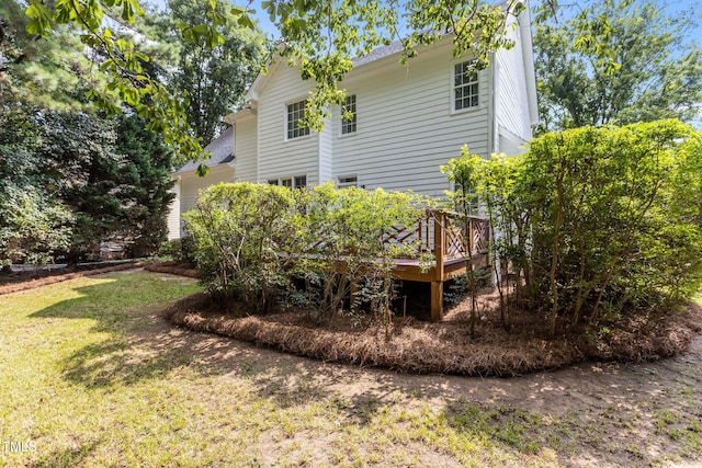 1401 Patterson Grove Rd, Apex, NC 27502 - rear view of house featuring a lawn and a wooden deck