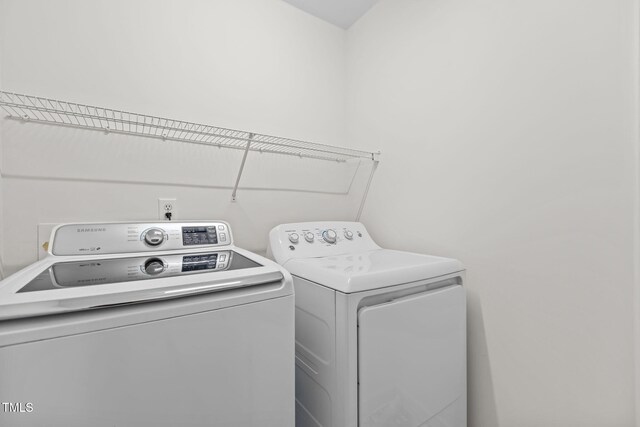1401 Patterson Grove Rd, Apex, NC 27502 - washroom featuring washing machine and dryer