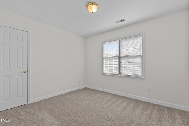 1401 Patterson Grove Rd, Apex, NC 27502 - carpeted empty room with baseboards