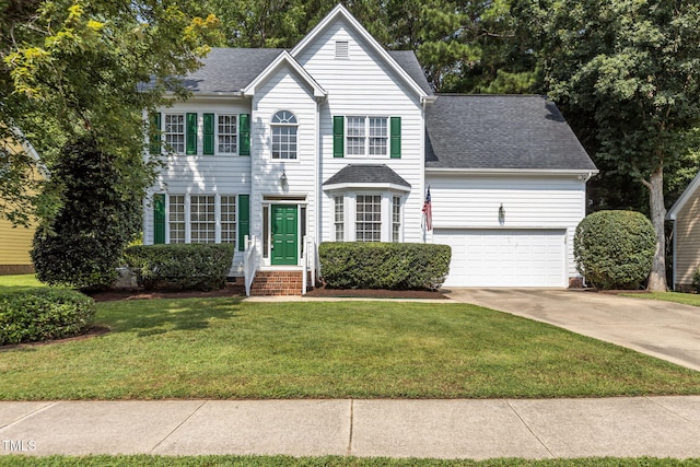 1401 Patterson Grove Rd, Apex, NC 27502 - view of front facade with a shingled roof, concrete driveway, a front yard, and an attached garage