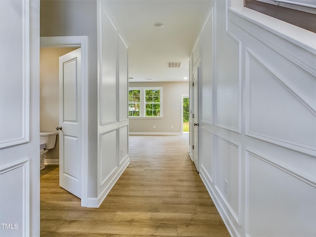 197 Delma Grimes Rd, Coats, NC 27521 - corridor with light wood-type flooring and baseboards