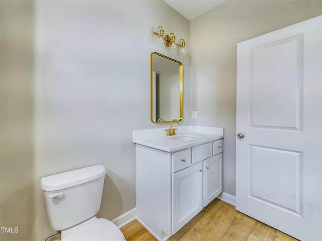 197 Delma Grimes Rd, Coats, NC 27521 - half bathroom featuring vanity and wood finished floors