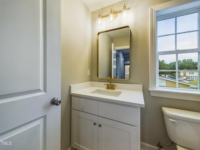 197 Delma Grimes Rd, Coats, NC 27521 - half bathroom featuring vanity and toilet