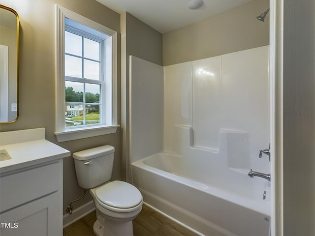 197 Delma Grimes Rd, Coats, NC 27521 - bathroom with vanity, bathing tub / shower combination, and wood finished floors