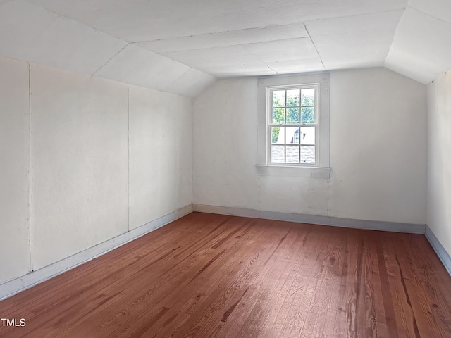 1116 E Martin St, Raleigh, NC 27610 - additional living space featuring lofted ceiling and wood finished floors