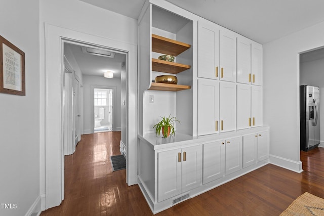 1116 E Martin St, Raleigh, NC 27610 - hall with dark wood-type flooring