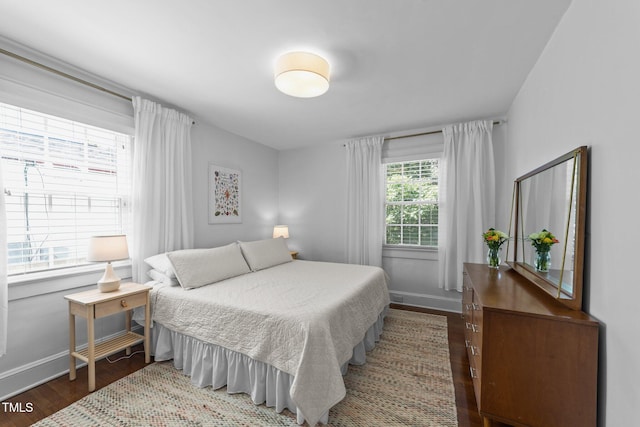 1116 E Martin St, Raleigh, NC 27610 - bedroom featuring baseboards and wood finished floors