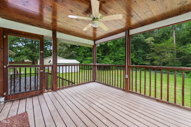 410 Sherron Rd, Durham, NC 27703 - deck featuring ceiling fan, a lawn, and an outdoor structure