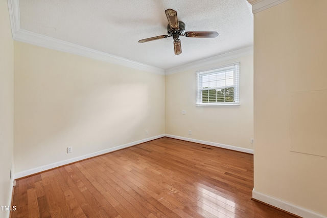 410 Sherron Rd, Durham, NC 27703 - unfurnished room featuring ornamental molding, hardwood / wood-style flooring, ceiling fan, and a textured ceiling