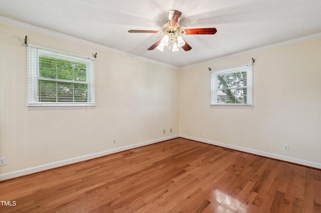 410 Sherron Rd, Durham, NC 27703 - spare room featuring light wood finished floors, crown molding, and ceiling fan