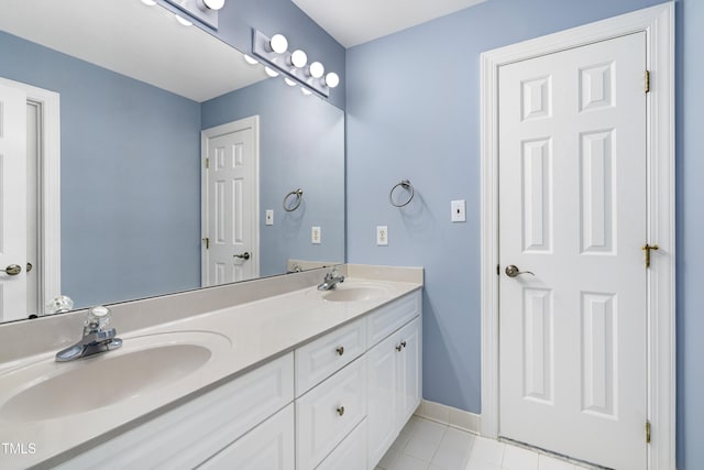 102 Glenmore Rd, Cary, NC 27519 - full bathroom featuring double vanity and tile patterned flooring