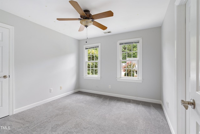 102 Glenmore Rd, Cary, NC 27519 - carpeted empty room with baseboards and a ceiling fan