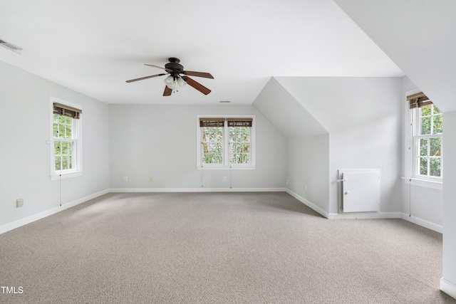 102 Glenmore Rd, Cary, NC 27519 - additional living space with light colored carpet, healthy amount of natural light, ceiling fan, and vaulted ceiling