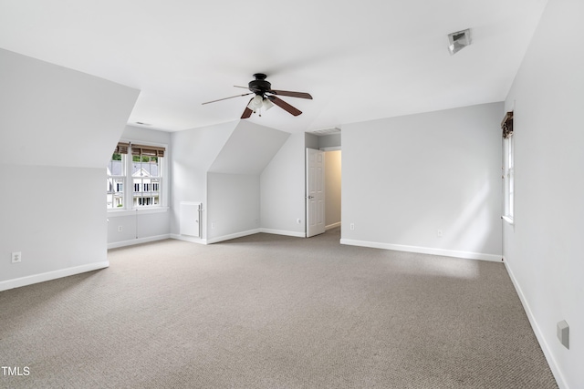 102 Glenmore Rd, Cary, NC 27519 - additional living space with carpet, a ceiling fan, and vaulted ceiling