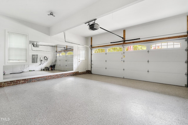 102 Glenmore Rd, Cary, NC 27519 - garage featuring electric panel and a garage door opener