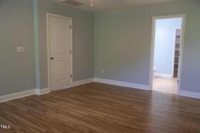 4921 Sweet Shade Trl, Raleigh, NC 27616 - unfurnished room with wood finished floors and baseboards