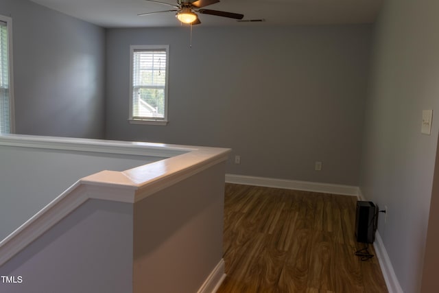4921 Sweet Shade Trl, Raleigh, NC 27616 - corridor with dark wood-type flooring and baseboards