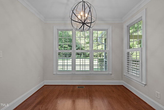 3005 Canopy Woods Dr, Apex, NC 27539 - unfurnished dining area with a chandelier, dark wood-style flooring, and crown molding