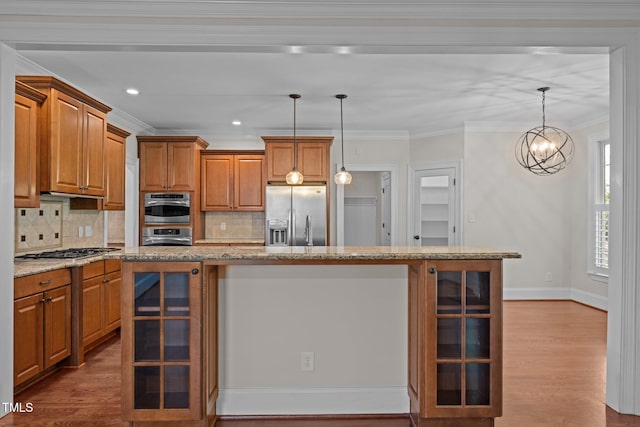 3005 Canopy Woods Dr, Apex, NC 27539 - kitchen with stainless steel appliances, brown cabinetry, decorative backsplash, glass insert cabinets, and dark wood-style floors