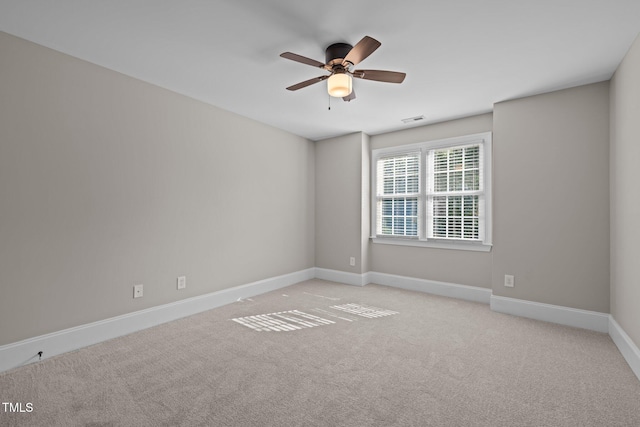 3005 Canopy Woods Dr, Apex, NC 27539 - spare room with a ceiling fan and light carpet
