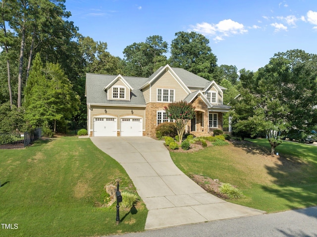 3005 Canopy Woods Dr, Apex, NC 27539 - view of front of house with driveway, a garage, and stone siding