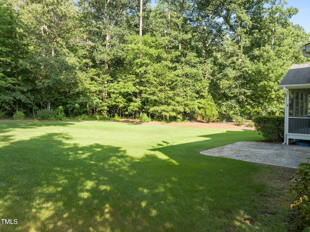 3005 Canopy Woods Dr, Apex, NC 27539 - view of green lawn featuring a patio and a sunroom
