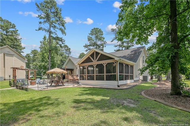 72 Orchard Falls Dr, Spring Lake, NC 28390 - rear view of property with a patio area, a gazebo, a yard, and a sunroom
