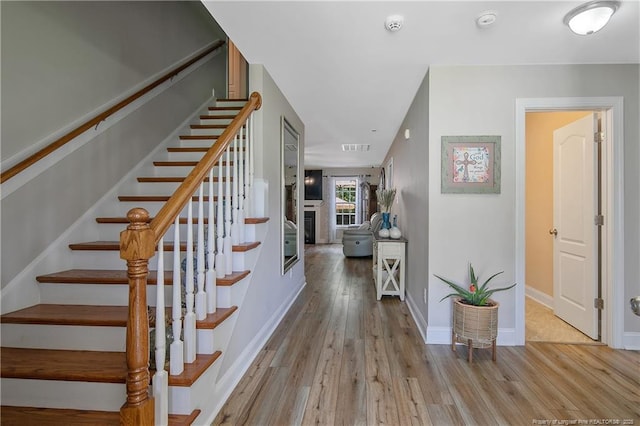 72 Orchard Falls Dr, Spring Lake, NC 28390 - staircase with wood finished floors