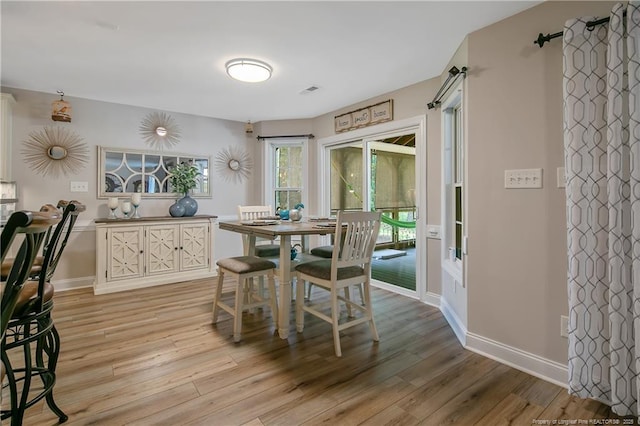 72 Orchard Falls Dr, Spring Lake, NC 28390 - dining room with light wood-style flooring
