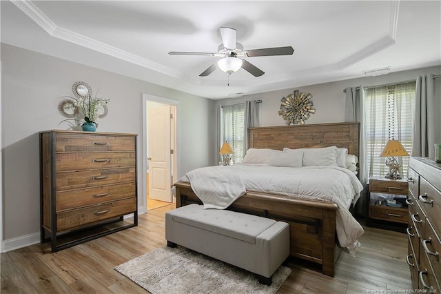 72 Orchard Falls Dr, Spring Lake, NC 28390 - bedroom with a tray ceiling, wood finished floors, crown molding, and a ceiling fan