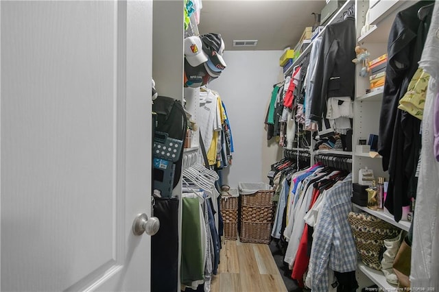 72 Orchard Falls Dr, Spring Lake, NC 28390 - walk in closet with wood finished floors