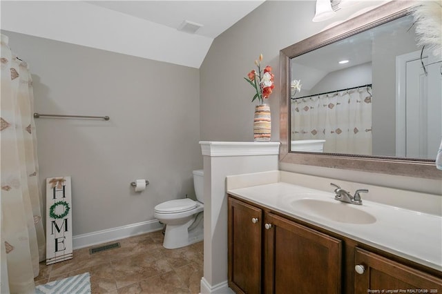 72 Orchard Falls Dr, Spring Lake, NC 28390 - bathroom featuring vaulted ceiling and vanity